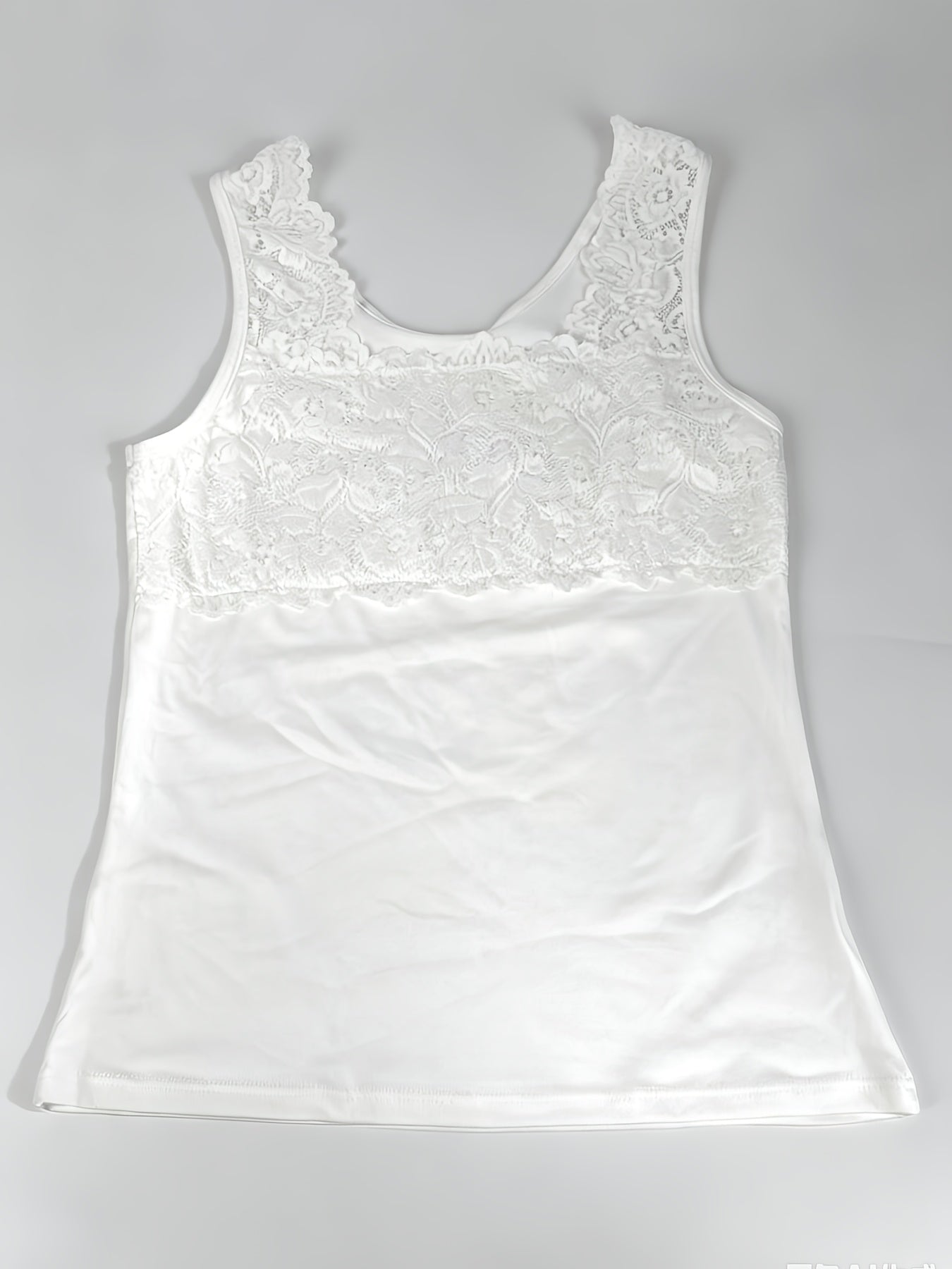 new lace trimmed spaghetti strap top versatile
