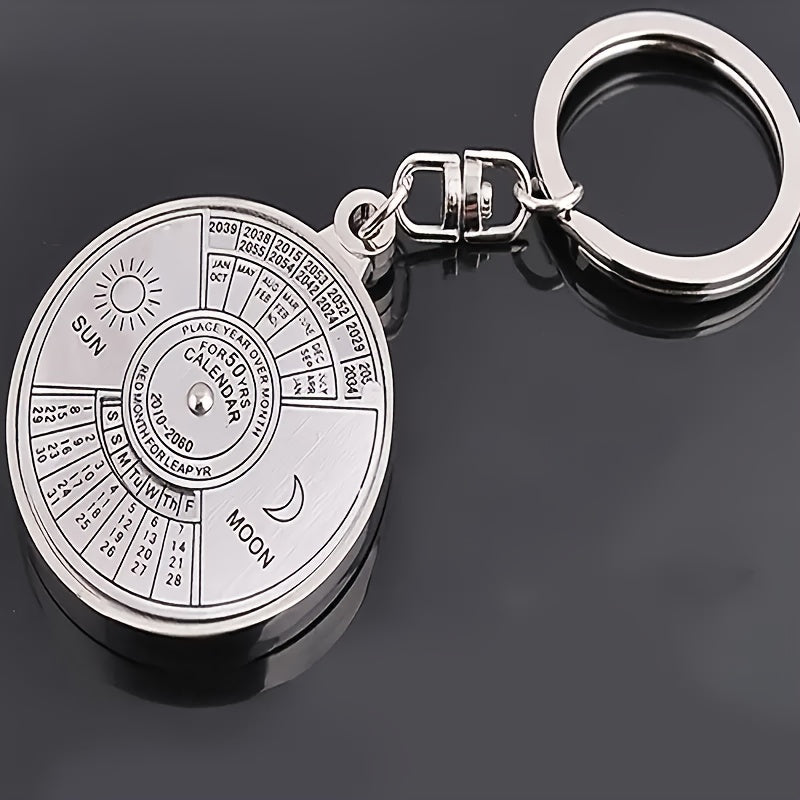 50 year perpetual calendar keyring silvery colored alloy