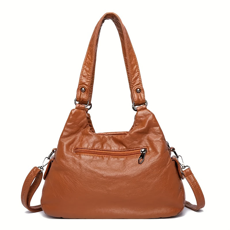 luxury handbag women featuring multiple pockets a designer