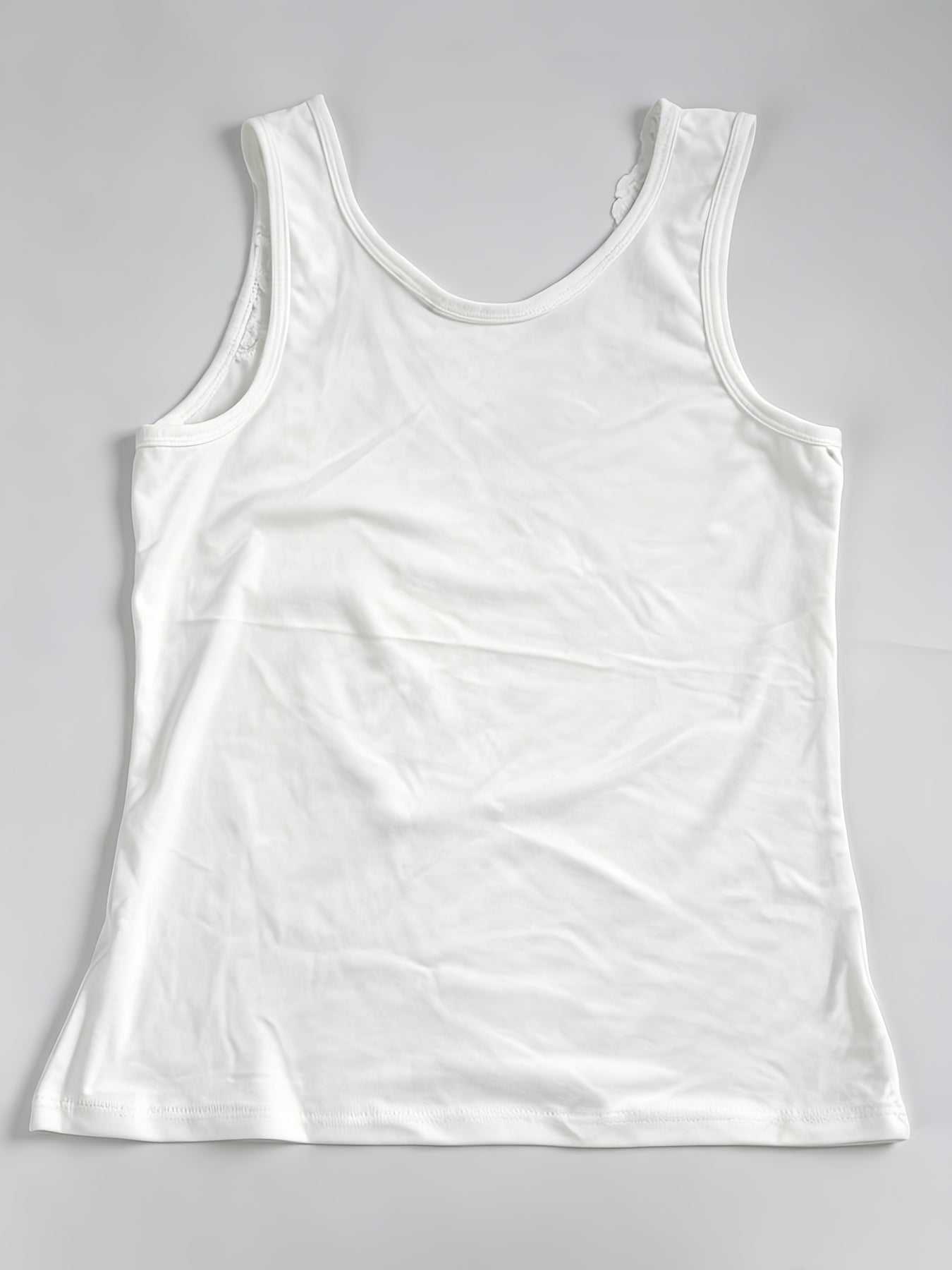new lace trimmed spaghetti strap top versatile