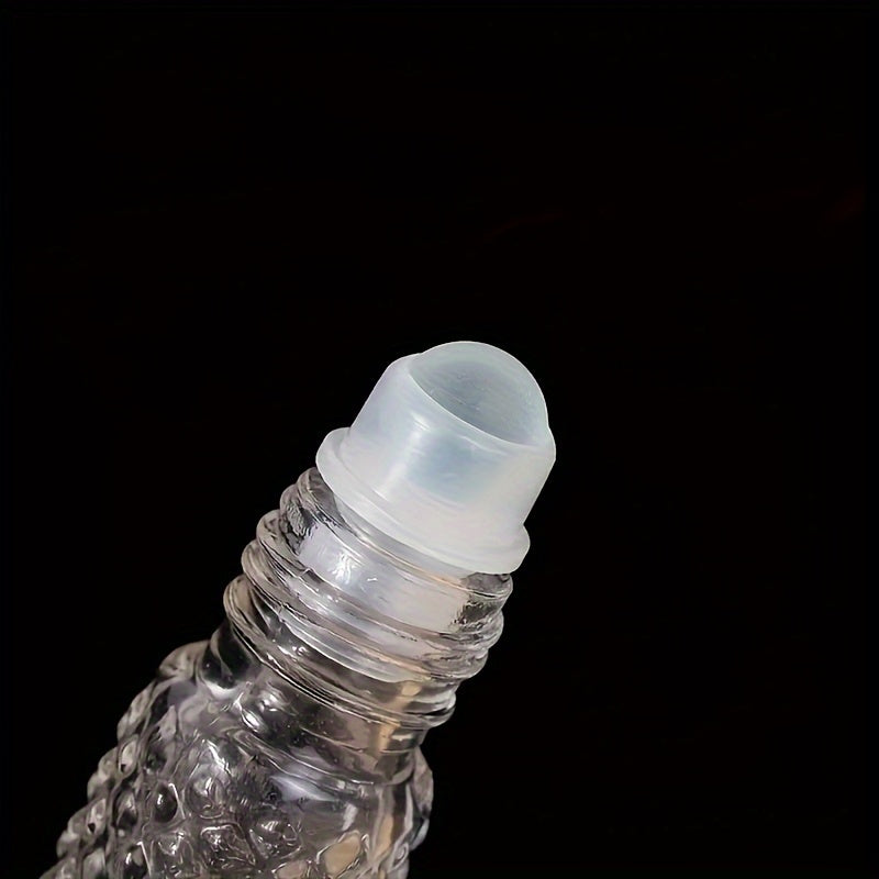 two refillable glass ball bottles designed cosmetics
